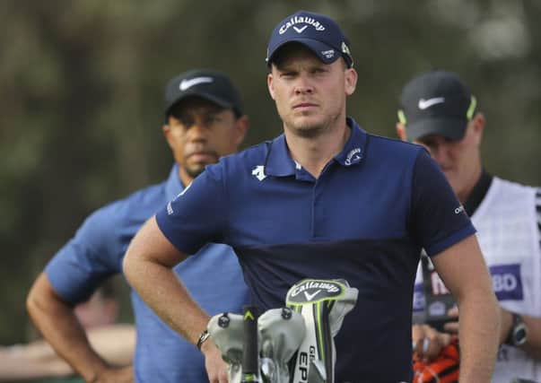 Hes behind you: Sheffields Masters champion Danny Willett and Tiger Woods prepare to tee off at the 11th hole. (Picture: AP Photo)