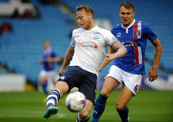 Carlisle's Charlie Wyke, right, has joined Bradford City