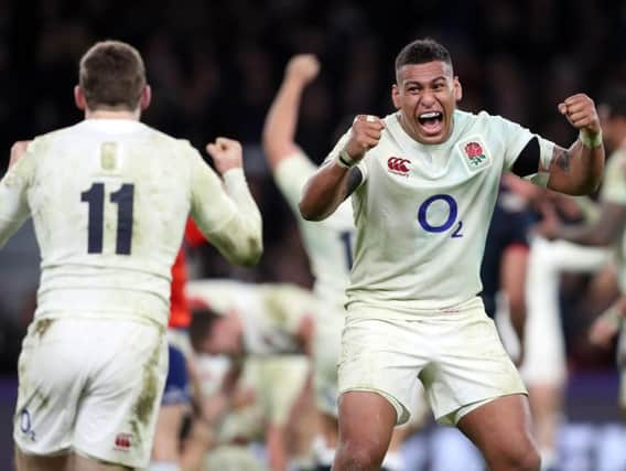 Jonny May and Nathan Hughes celebrate England's victory (Photo: PA)