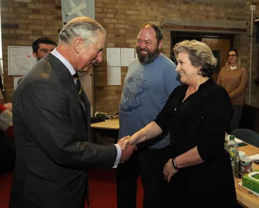 Prince Charles met actor Mark Addy at the Holy Apostles' Church, Hull. Picture by Simon Hulme