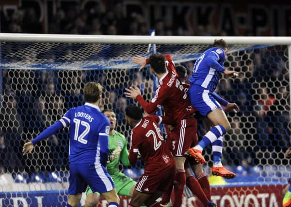 Jordan Rhodes, who had a fine scoring record at Hillsborough with away teams, scores in a Sheffield Wednesday shirt last night against Birmingham City (Picture: Steve Ellis).