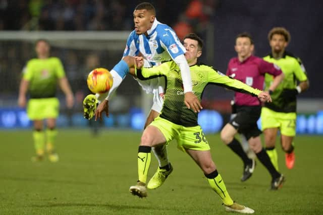 Colin Quaner beats Liam Kelly to a high ball during Tuesday night's clash.  Picture: Bruce Rollinson