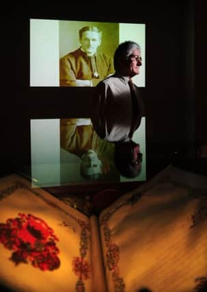 New Exhibition Caught in the Russian Revolution at the Parkinson Building, Leeds..Curator Richard Davies is pictured with a portrait of Reverend Lombard at the Exhibition.22nd February 2017 ..Picture by Simon Hulme