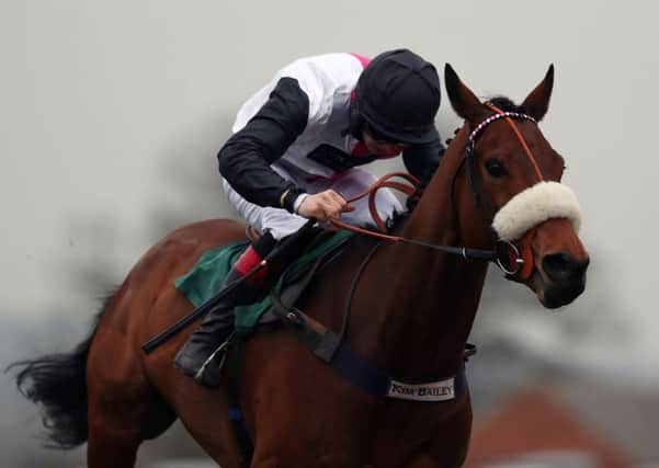 Bandon Roc ridden by Henry Morshead on their way to victory in the Towcester Handicap Hurdle. Picture: David Davies/PA.