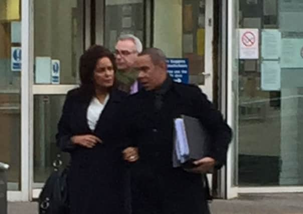 Paula Vasco-Knight and her brother (right) and her husband Stephen (centre behind) leaving Exeter Crown Court.  Pic: Claire Hayhurst/PA Wire