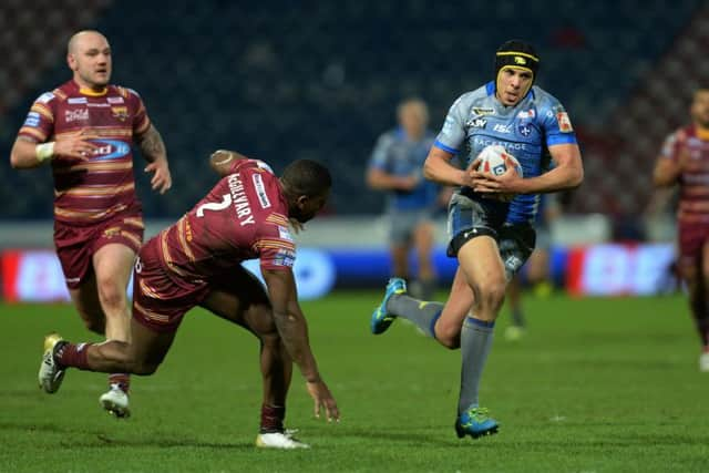 Ben Jones-Bishop breaks through for Wakefield's second try against Huddersfield Giants.  Picture: Bruce Rollinson