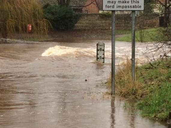 The Firs Avenue ford during a flood in 2015