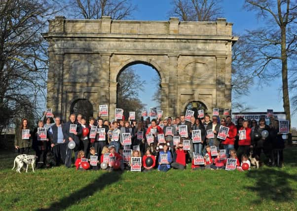 Campaigners gather to proitest against plans for 5000 homes to be built on green belt land on the Parlington estate between Aberford and Barwick. Picture Tony Johnson.