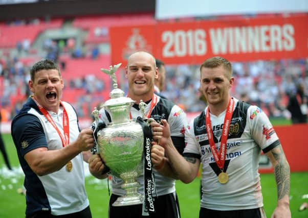 Hull's Lee Radford, Gareth Ellis and Marc Sneyd celebrate their Challenge Cup final over Warrington last August.