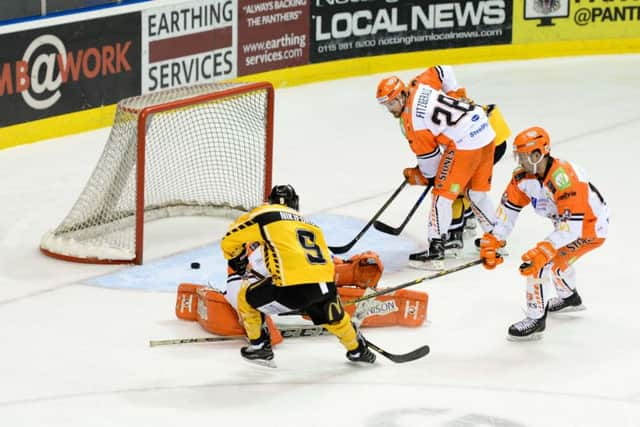 FIRST STRIKE: Alex Nikiforuk (No 9) pounces to make it 1-0 to Nottingham against Sheffield Steelers on Saturday night. Picture: Karl Denham/EIHL.