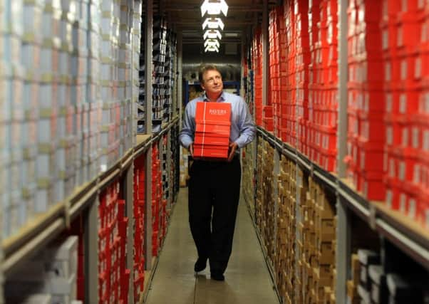 24/1/14  Stuart Paver of Pavers Shoes in their warehouse  at Upper Poppleton in York .
 (GL1001/93d)