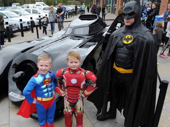 The Batman meets mini Iron Man and Superman