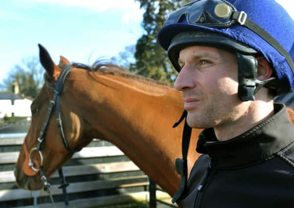 Definity Red  with jockey  Danny Cook.