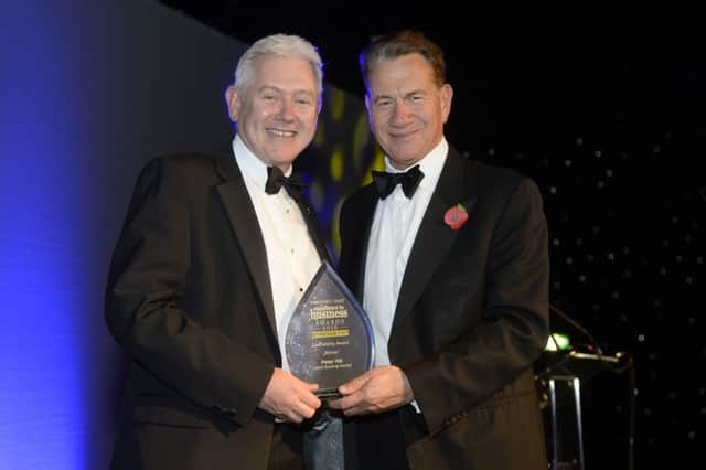 Leadership Award. Peter Hill of the Leeds Building Society with Michael Portillo.
Yorkshire Post Excellence in Business Awards 2016.  New Dock Hall.  4 November 2016.  Picture Bruce Rollinson