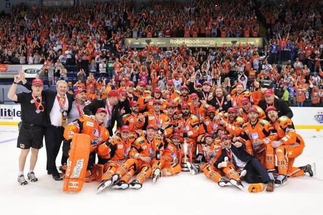 WINNERS: Sheffield Steelers celebrate their Elite League Play-off win over Cardiff Devils in Nottingham on Sunday. Picture: Dean Woolley.