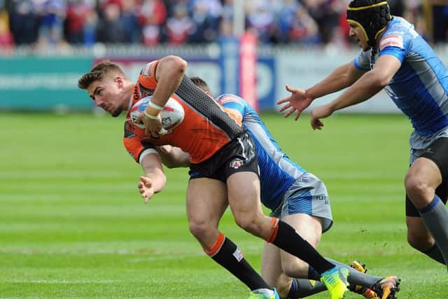 ON THE UP: Castleford Tigers' Greg Minikin. Picture: Scott Merrylees