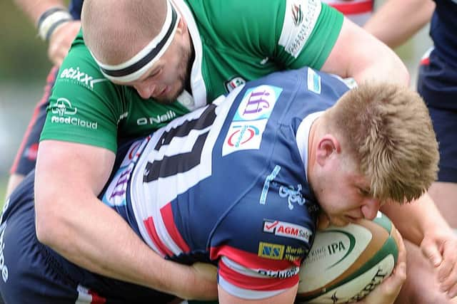 Doncasters David Nelson is held up by London Irish (Picture:: Scott Merrylees).