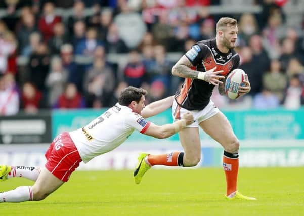 St Helens'  Matty Smith tackles Castleford's Zak Hardaker. Picture: Chris Mangnall/SWpix.com