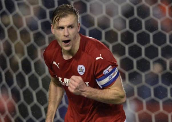 Barnsley central defender Marc Roberts missed the second half at Ashton Gate after damaging his ankle (Picture: Bruce Rollinson).