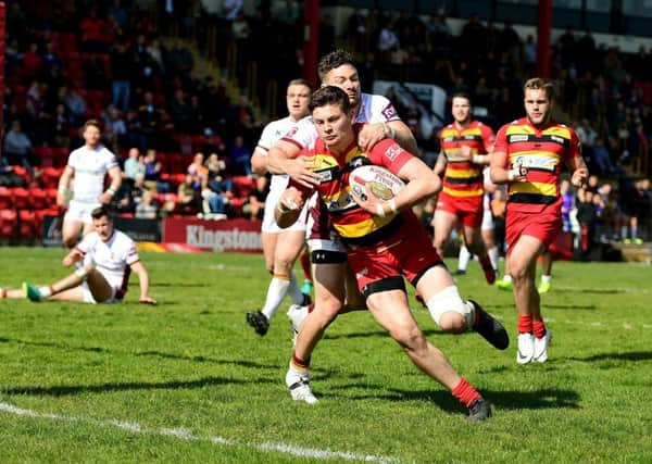 Josh Gudzek scores for Dewsbury.