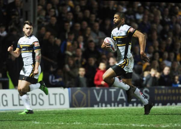 Kallum Watkins scores a try for Leeds Rhinos against Wigan Warriors last month.