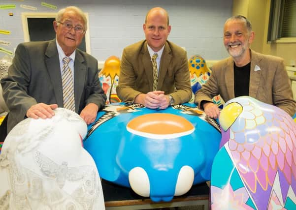 From left to right Michael Baiton, Andrew Baitson and Rick Welton (Amy Johnson festival director) with the moths which are up for auction on May 6