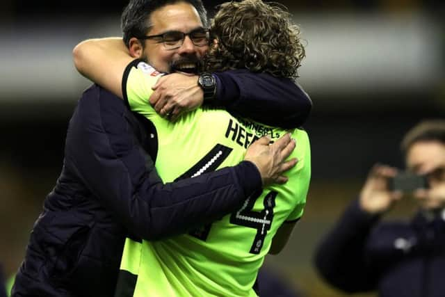 David Wagner celebrates alongside Michael Hefele at full-time