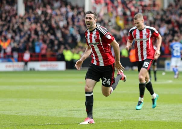 Sheffield United's Daniel Lafferty celebrates scoring en route to the Blades winning the League One title (Picture: David Klein/Sportimage).