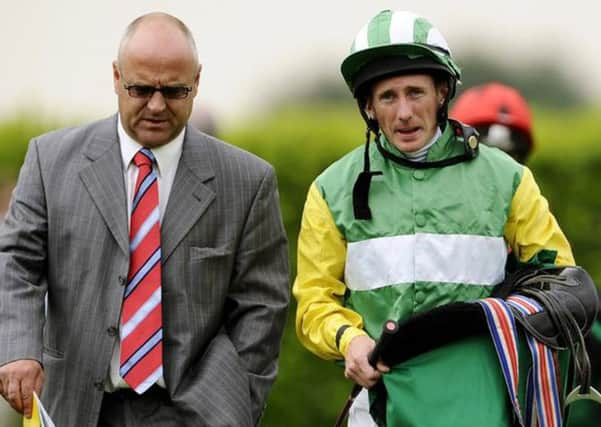 Paul Hanagan, right, and trainer Richard Fahey