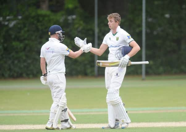 In vain: Simon Lambert, right, 147 runs but New Farnley were beaten by Hanging Heaton in the Bradford League. (Picture: Steve Riding)