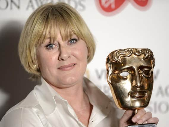 Happy Valley star Sarah Lancashire with her Bafta award.