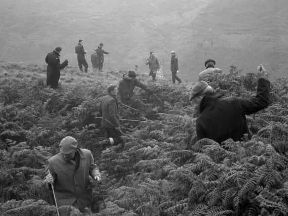 Police searching on Saddleworth Moor for victims of moors murderer Ian Brady, who has died at the age of 79, at Ashworth High Secure Hospital, Merseyside. PA