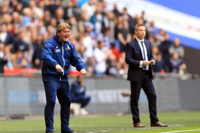 Bradford City manager Stuart McCall (left) and Millwall manager Neil Harris. Picture: Nigel French/PA.