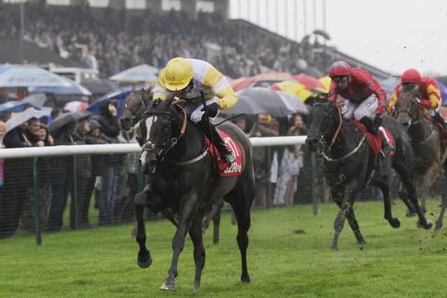 Quiet Reflection, ridden by Dougie Costello, (left) wins the 32 Red Sprint Cup Stakes at Haydock last September. Picture: John Giles/PA Wire