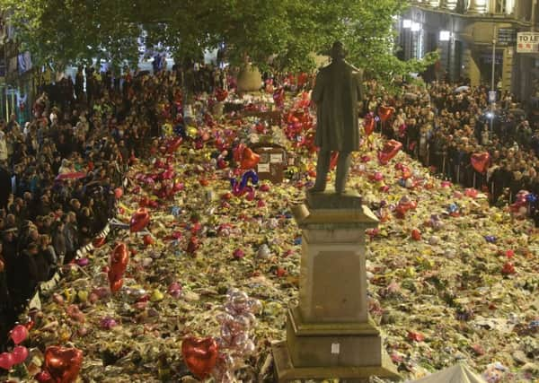 The makeshift shrine in Manchester in memory of last week's terrorist victims.