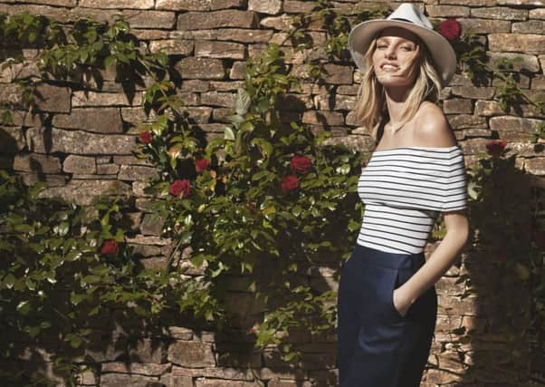 Striped Bardot top, Â£45; trousers, Â£85; hat, Â£45. All at Hobbs.