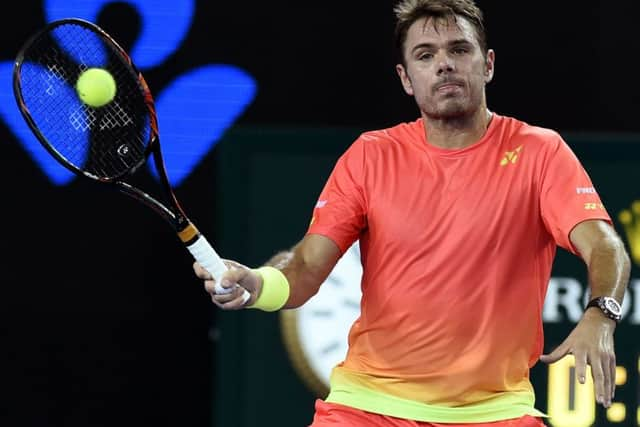 Stan Wawrinka of Switzerland stands in Andy Murray's way.(AP Photo/Andrew Brownbill)