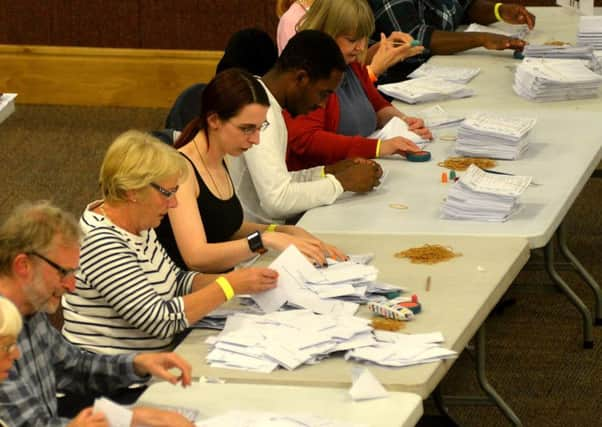 The counters being sorting through ballot papers at Huddersfield. Picture: Andrew Bellis