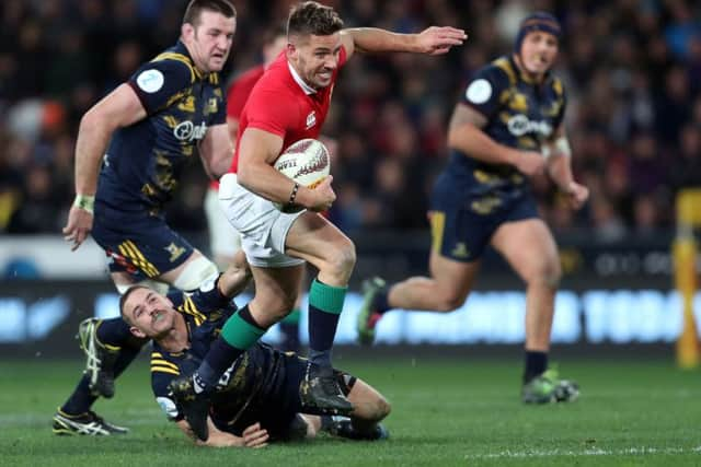 Rhys Webb breaks a tackle in Dunedin