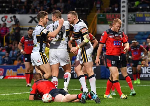 Brad Singleton celebrates scoring his second try.