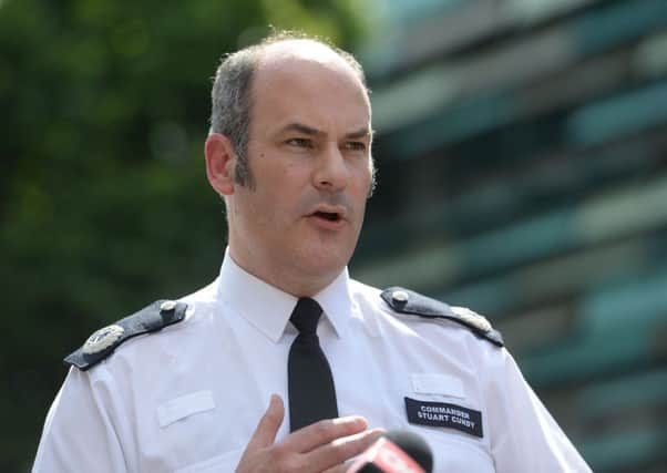 Metropolitan Police Commander Stuart Cundy speaking to the media near Grenfell Tower.