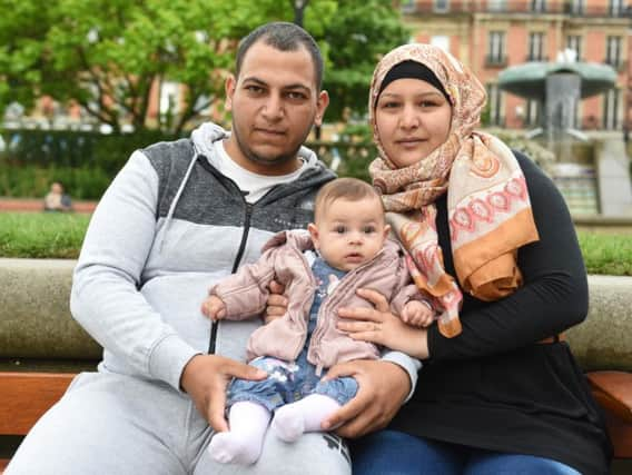 Ali Helal, Burouk Aldbi and daughter Elizabeth, who they named after Her Majesty the Queen to say thanks for taking them in