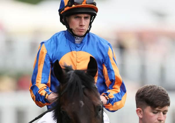 Sioux Nation ridden by jockey Ryan Moore.