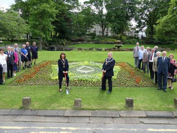 The Mayor of Harrogate Coun Anne Jones and the Provincial Grand Master of The Province of Yorkshire West Riding, David S Pratt, are watched by Harrogate Freemasons council employees as the pair perform the honours. Picture: Different PR