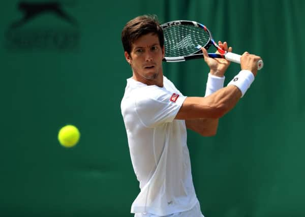 Aljaz Bedene in action against Gilles Muller.