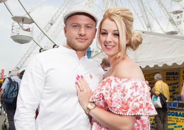 Luke Davison proposed to girlfriend Ashley Addy at the top of the big wheel as a plane flew over with a banner said Ashley Addy will you marry me.