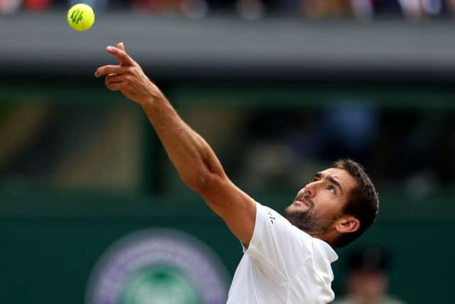 THROUGH: Marin Cilic serves against Sam Querrey. Picture: Steven Paston/PA