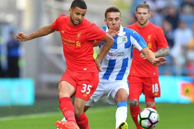 Done deal: Liverpool's Kevin Stewart has signed for Hull City.