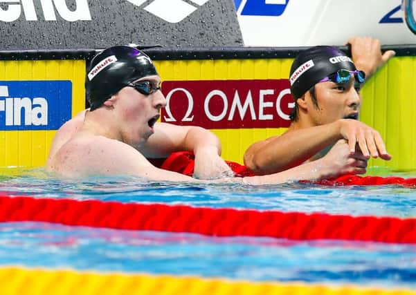 City of Sheffields Max Litchfield looks dismayed as the scoreboard in Budapest shows the result of the World Championship 200m mens individual medley race in which he was edged out of the medal positions by Chinas Shun Wang by 0.6 of a second (Picture: Rogan Thomson/SWpix.com).