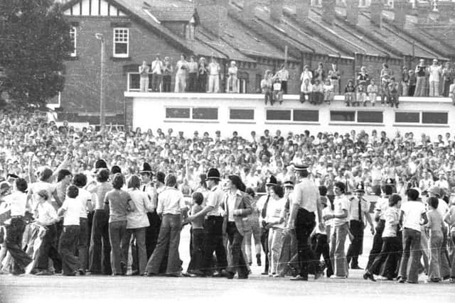 The cricket legend gets mobbed by fans at Headingley.